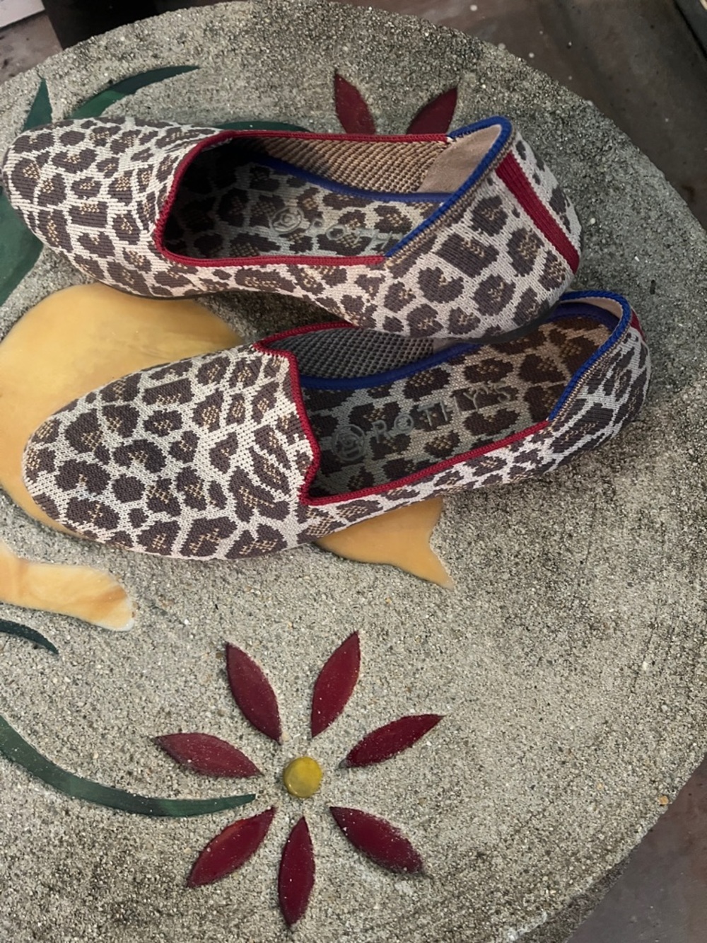 Rothy's Desert Cat Slip-On Flats with Red & Blue Trim